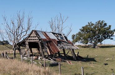 Old timber barn falling apart on rural property