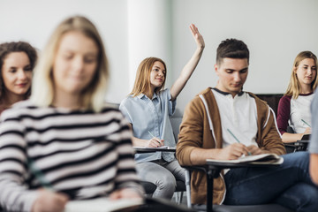 High School Student Rising Hands