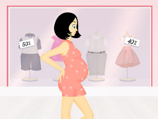 Pregnant woman on baby shop