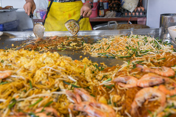 Thai food Pad thai, stir fry noodles with in padthai style on food court in Chiang Mai