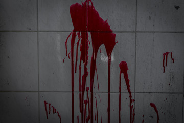 Blood on the wall in house of ruin.