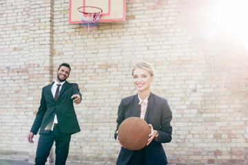 business colleagues with basketball ball