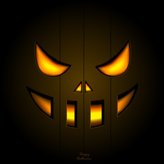 Halloween pumpkin glowing in darkness