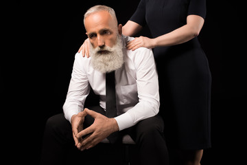 Sad man sitting on chair