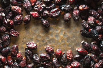 Frame of dry rose hips close-up