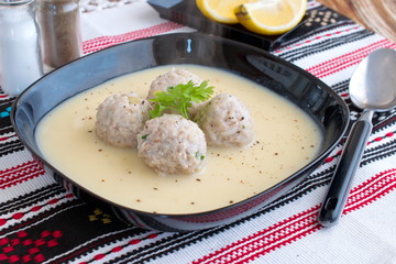 Meatballs with mint and rice in a lemon-egg sauce. Traditional greek food. Healthy eating concept. Mediterranian lifestyle