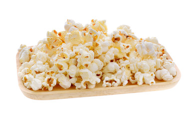 Pop corn in wood plate  isolated on white background