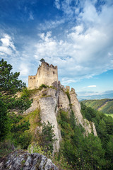 Fototapeta na wymiar The ruins of a medieval castle Lietava on a rocky blade, nearby Zilina town, Slovakia, Europe.