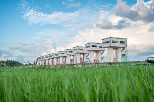 Architecture building beautiful Utho Wipat prasit floodgates over grass