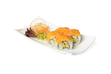 Plate of sushi rolls with salad