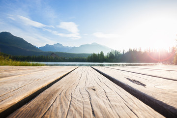 Alpine mountain lake sunny morning view