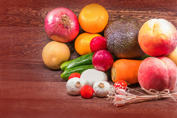 Fresh organic fruits and Vegetable on wooden table wall background with copy space .