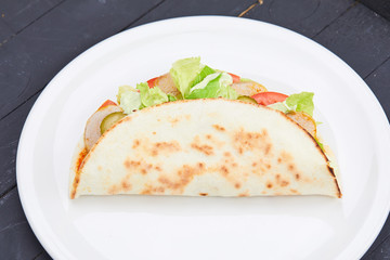 sandwich wrap with meat and vegetables