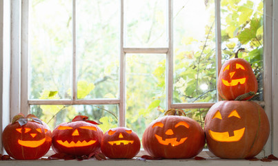 halloween pumpkins on window