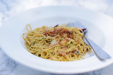 Spaghetti carbonara with ham in white plate - Italian food style