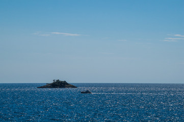 Boat and small island on the Croatian coast