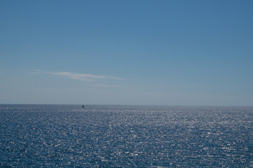 Ship sailing the vastness of the sea