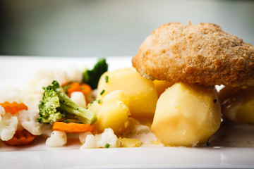 Chicken Kiev with vegetables