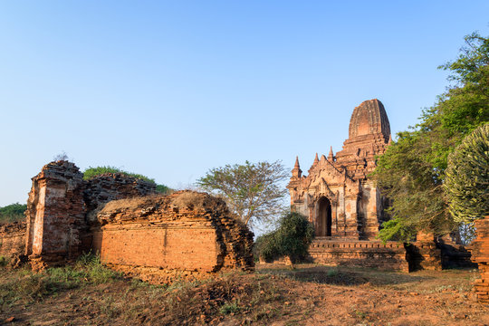 Shwe Leik Too Temple and ruins of the surrounding wall in Bagan, Myanmar (Burma) in the morning.