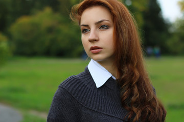 red-haired girl in autumn jacket