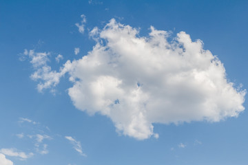 Large white cloud against the blue sky