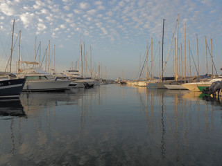 Fototapeta na wymiar An overview of the many pleasure boats moored at the marina of Saint Tropez.