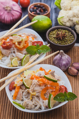 delicious Korean rice noodles with chicken.