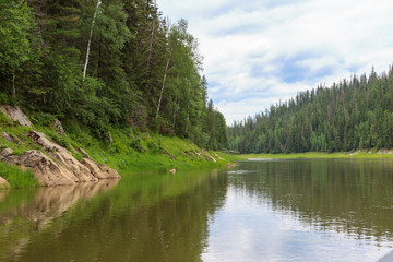 Fototapeta na wymiar A small tributary of the Yenisei River. Krasnoyarsk region, Russia 