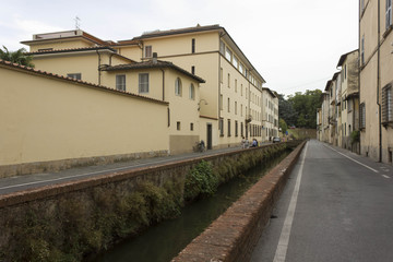 Fototapeta na wymiar Ditch road in Lucca City in Tuscany, Italy