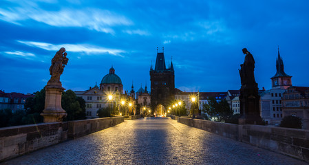 Charles Bridge over the Vltava river in Prague at night, Czech Republic