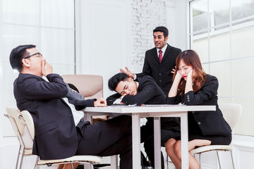 Group of business people sleeping at the meeting