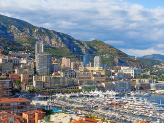 Fototapeta premium A view of Port Hercule and its surrounding skyline in Monaco.