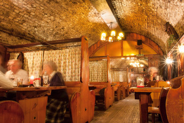 Historical restaurant with people having dinner