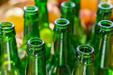 Close up of empty beer bottles. Shallow depth of focus. Concept Save the planet, recycle.|