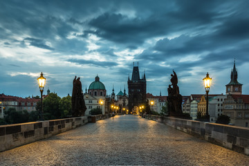 Dramatic clouds over the Charles Bridge over the Vltava river in Prague, Czech Republic