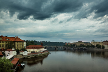 Fototapeta na wymiar Franz Kafka museum and Vltava river in Prague, Czech Republic