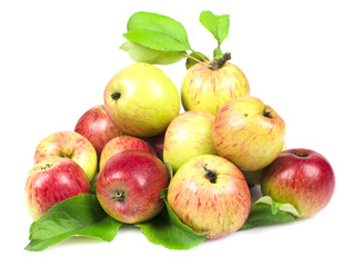 Apples folded in a bunch with green leaves on white background