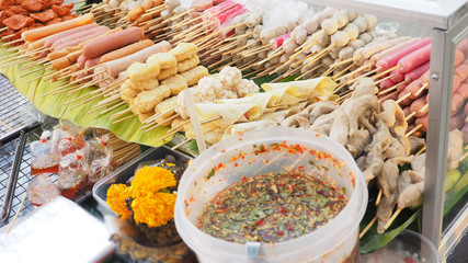 Sausage with variety meatballs and as sweet and sour spicy sauce on sale