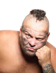 Obraz premium Angry, aggressive, bearded man with mohawk