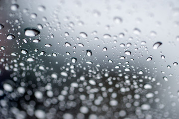 Water drops color background rain glass space rainbow.