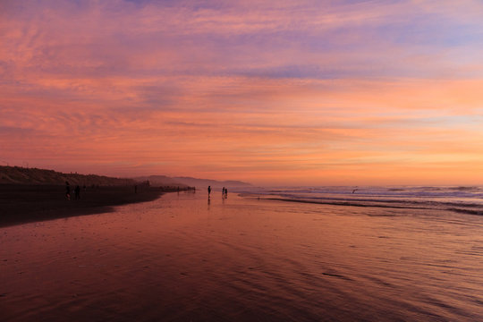 Blue, Pink, And Purple Sky At Ocean Beach Sunset