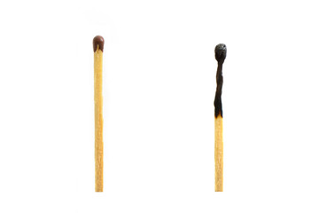 one whole and one burned match on a white background