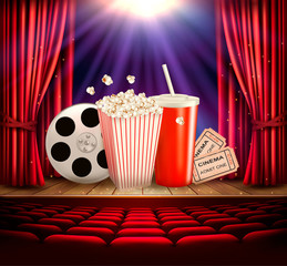 Obraz premium Cinema background with a film reel, popcorn, drink and tickets. Vector.