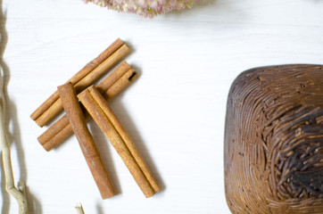 Dark brown burned clay dishes. Ceramics on the white background. Decorative pottery