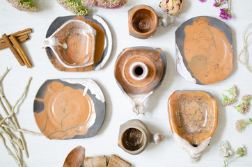 Set of dishes for coffee from clay. Decorative ceramics. Pottery cups and dishes