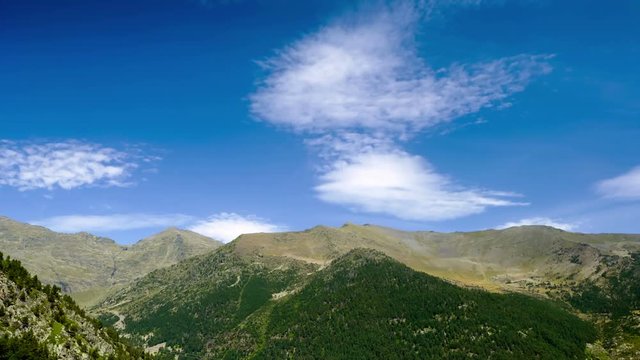 Landscape of mountains and sky with fast movement of clouds in Arinsal, Pyrenees of 
Andorra.Time Lapse
