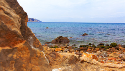 Fototapeta na wymiar Rocky beach. rocky coast of belyouneche morocco