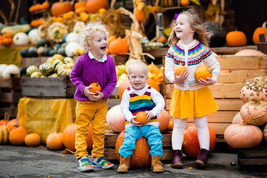 Kids Having Fun At Pumpkin Patch