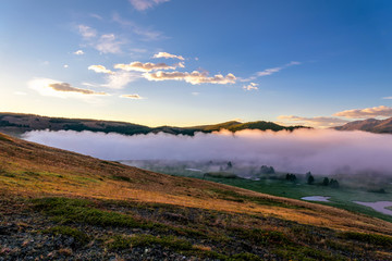 mountains fog lake dawn sunlight
