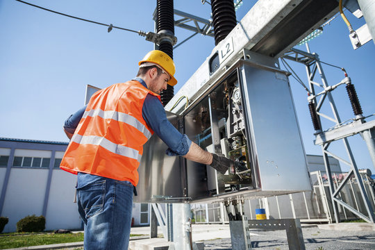 Engineer Checking Electricity Substation